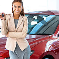 car loans thumbnail red car saleswoman small