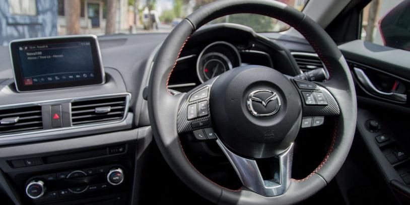 The interior of a Mazda3 Astina 2015